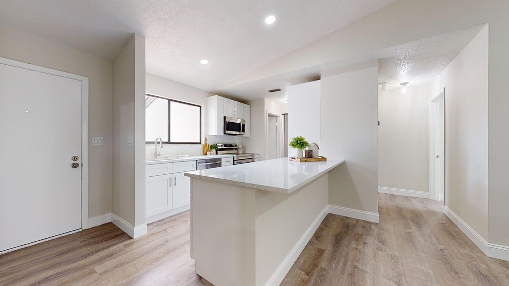 Photo of 14 Kensington Lane, Boynton Beach, FL 33426 (MLS # R11008644)