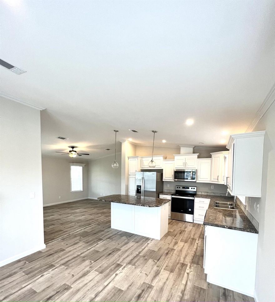 Stunning Modern 3-Bedroom, 2-Bathroom Home - manufactured in 2021.Don't miss this beautifully designed and spacious one-story home featuring 3 generously sized bedrooms and 2 full bathrooms. Manufactured in 2021, this move-in-ready property offers the perfect blend of modern style, functionality, and energy efficiency. Enjoy open-concept living with a bright, contemporary kitchen, large living and dining areas, and a charming backyard.Schedule your showing today, this gorgeous home won't last long!