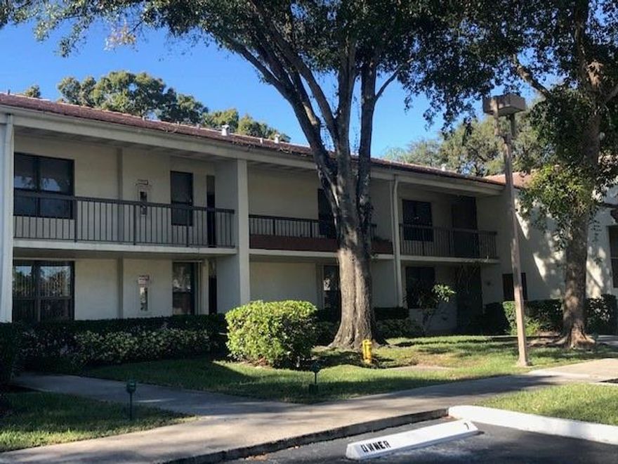 First floor remodeled 2/2 waterfront condo!  Knock down walls throughout!  Air conditioner installed in 2020!  impact windows! Sliders from living room and from master bedroom to tiled screened porch overlooking water!  Screened porch has both rolladens and accordian shutters!  Double protection.  Updated eat in kitchen with wood cabinets!  Both baths beautifully remodeled!  Tile flooring in living areas; newer laminate in bedrooms.  Master has not one but two closets!  Clubhouse, pool, and tennis make this complex the resort anyone would enjoy!