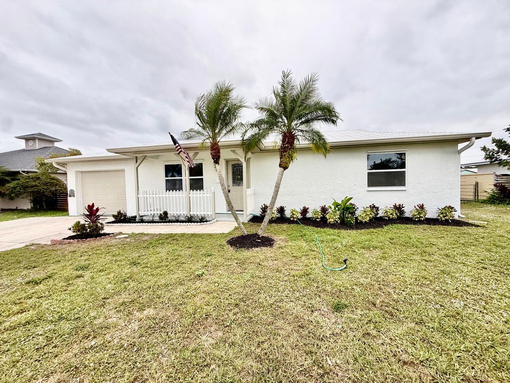 Photo of 520 NW Azalea Avenue, Port Saint Lucie, FL 34983 (MLS # R11148055)
