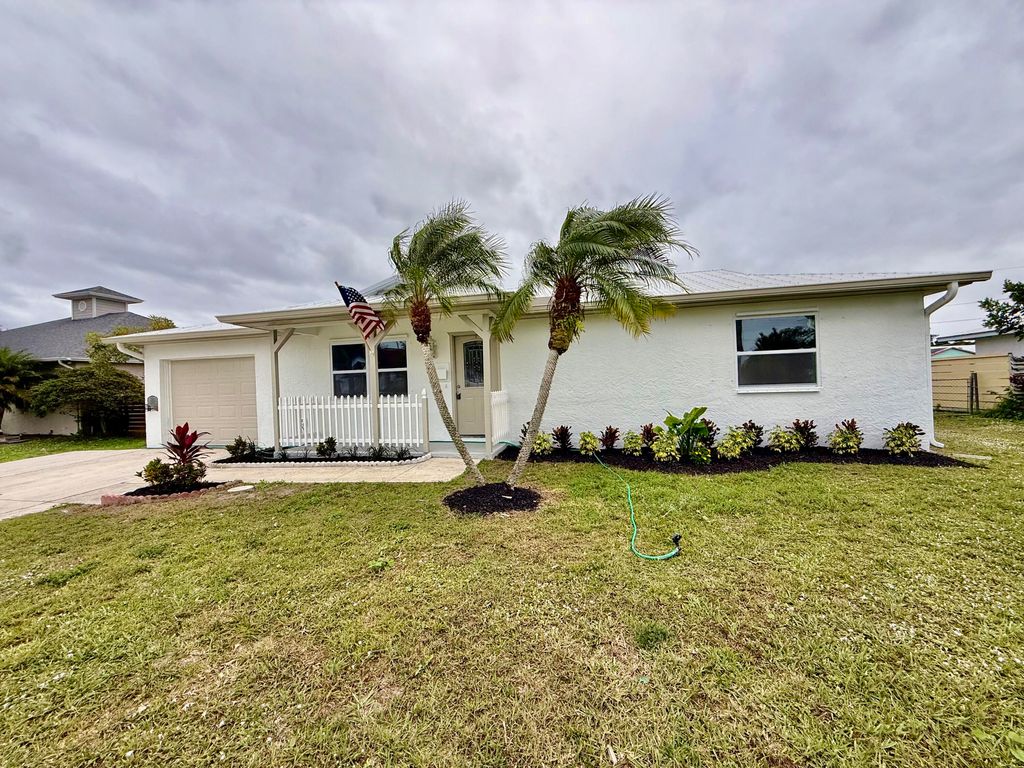 Photo of 520 NW Azalea Avenue, Port Saint Lucie, FL 34983 (MLS # R11148055)