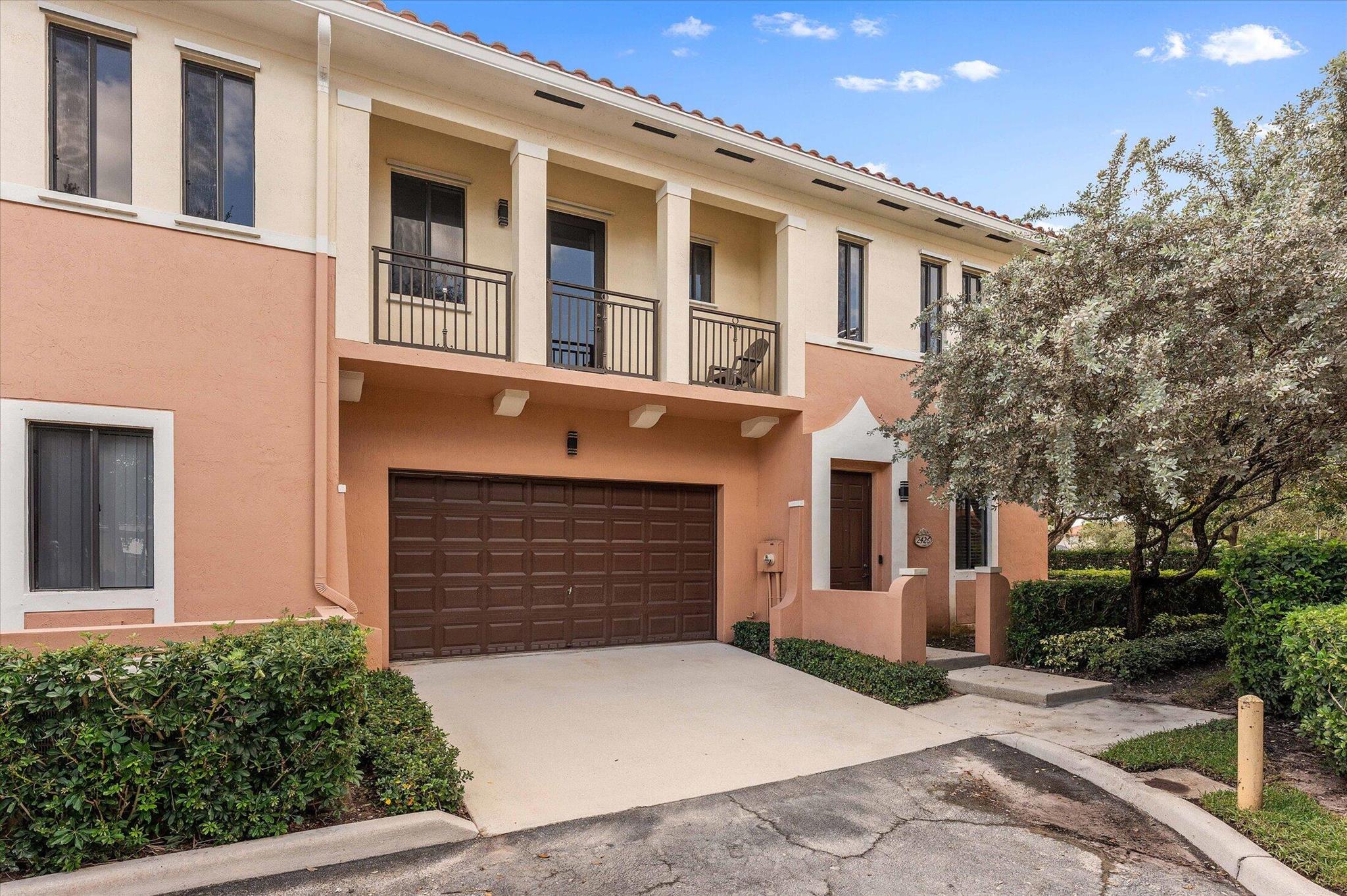 *This property qualifies for a closing cost credit up to $6,513 through the seller's preferred lender.*Step into this beautifully maintained end-unit townhome located in a secure, gated community - offering the perfect blend of space, privacy, and convenience. A grand two-story entrance with 22 ft ceilings welcomes you in, setting the tone for the open & airy layout throughout. Enjoy a spacious open backyard area, perfect for morning coffee, walks, or simply enjoying the outdoors. Recent updates include a new roof (2024). Perfectly located near I-95, beaches & Downtown Delray, this home puts everything within easy reach. The community is investor-friendly, allowing rentals immediately after closing. This property is priced to sell, offering exceptional value in a prime location.