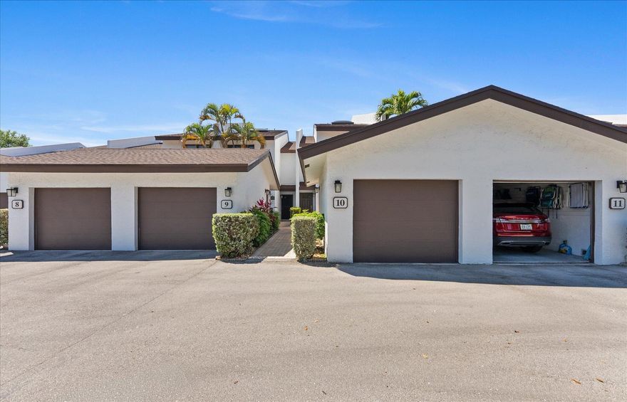 Sited directly on the Intracoastal and just one block from the beach, this beautifully & completely updated residence is an exceptional opportunity. Interior offerings include direct water views throughout, a stunning island kitchen with sleek cabinetry, quartz counters & waterfalls, new flooring thruout, all new bathrooms & ultra-lux  finishes. Relax and take in the 24/7 boat show from your screened porch or second-floor balcony A 2025 roof, impact windows/doors, a private garage & community day dock add to the home's appeal. Just a short stroll to the beach & restaurants. Units in this intimate community rarely come available.