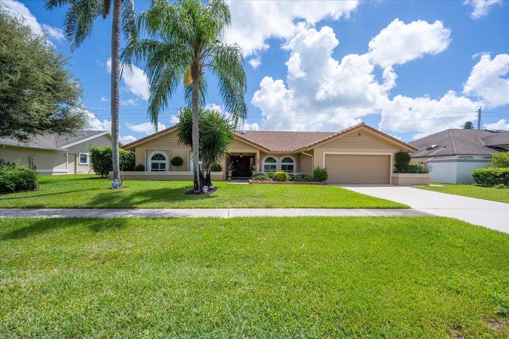 Photo of 1654 Farmington Circle, Wellington, FL 33414 (MLS # B26041190)