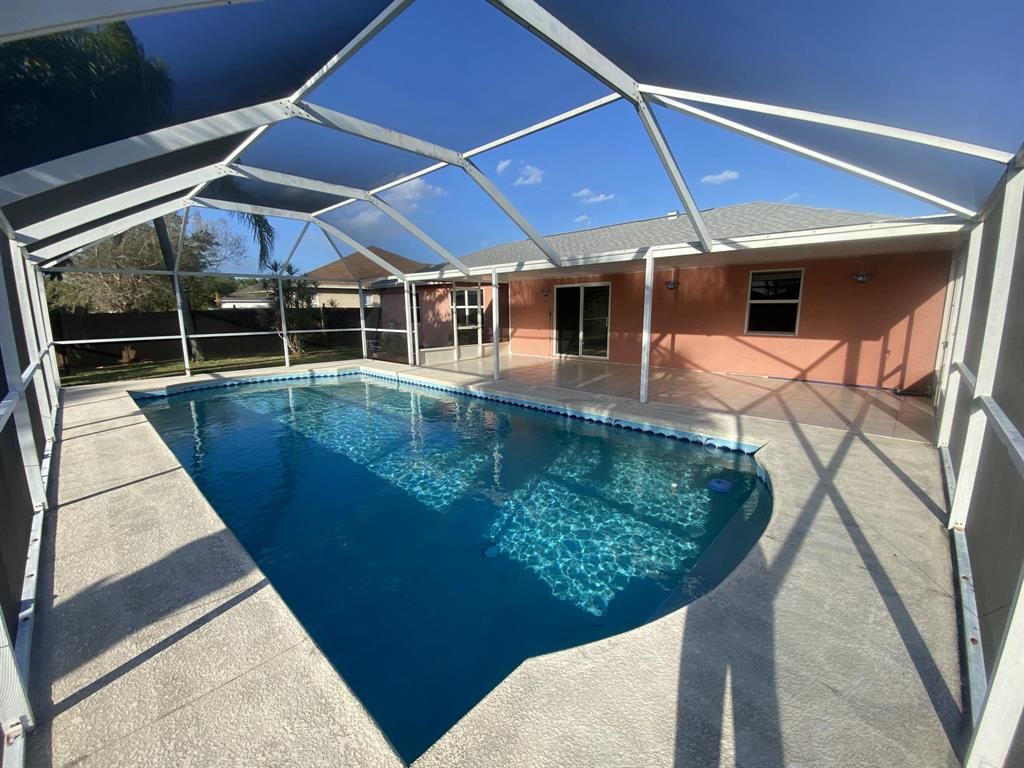 Photo of 2382 SW Blaine Terrace, Port Saint Lucie, FL 34953 (MLS # R10785853)