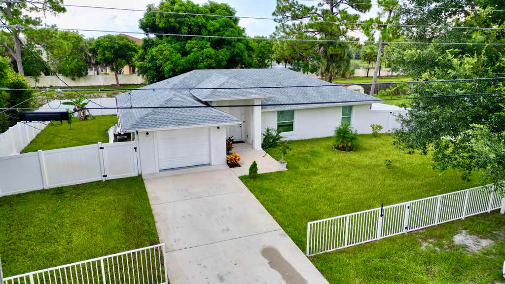 Photo of 6539 Alexander Road, West Palm Beach, FL 33413 (MLS # B26063122)