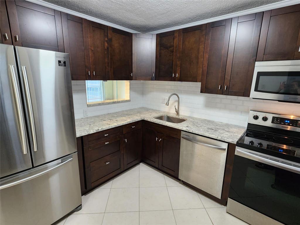 Photo of 4700 WASHINGTON Street #308, Hollywood, FL 33021 (MLS # B26062105)