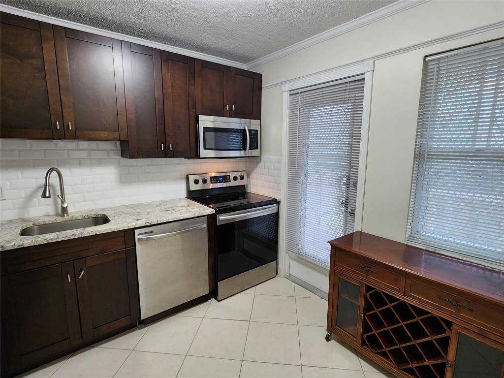 Photo of 4700 WASHINGTON Street #308, Hollywood, FL 33021 (MLS # B26062105)