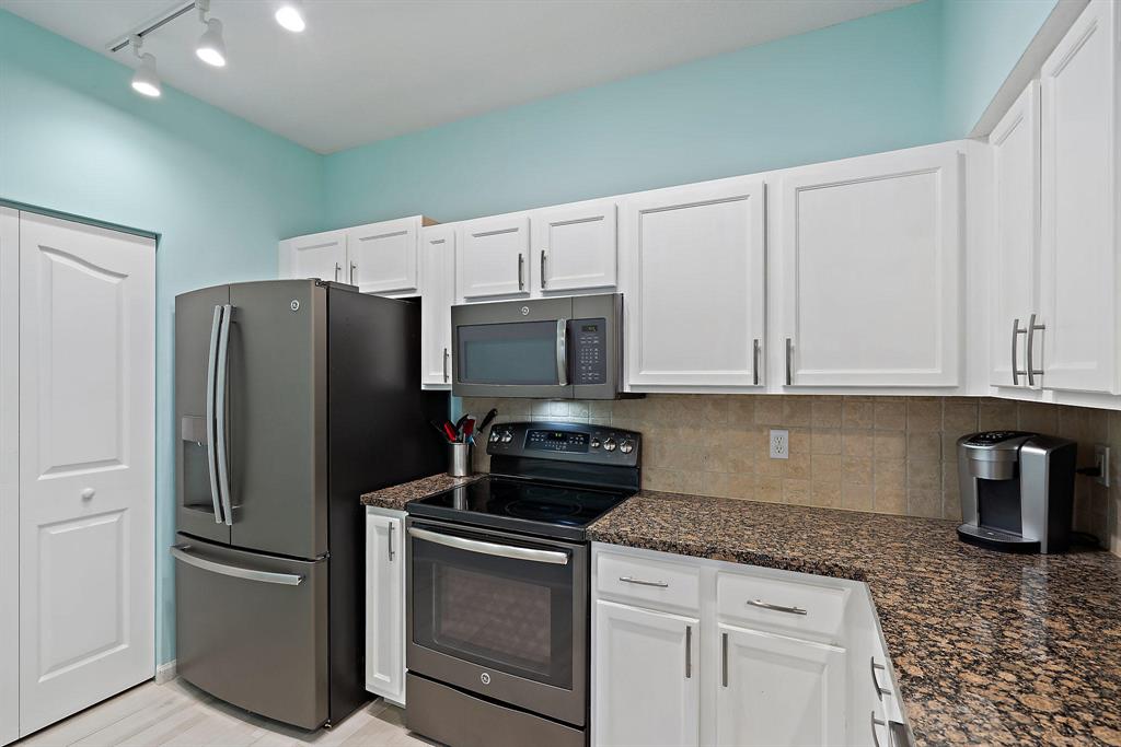 SOMERSET AT ABACOA CONDO - Residential