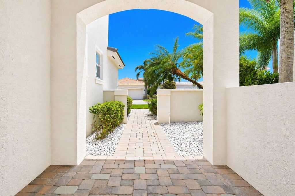 Photo of 207 Isle Verde Way, Palm Beach Gardens, FL 33418 (MLS # B26043218)