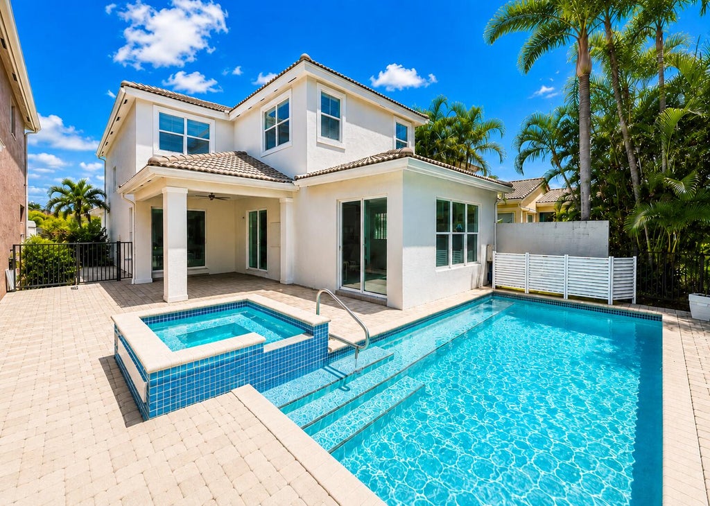 Photo of 207 Isle Verde Way, Palm Beach Gardens, FL 33418 (MLS # B26043218)