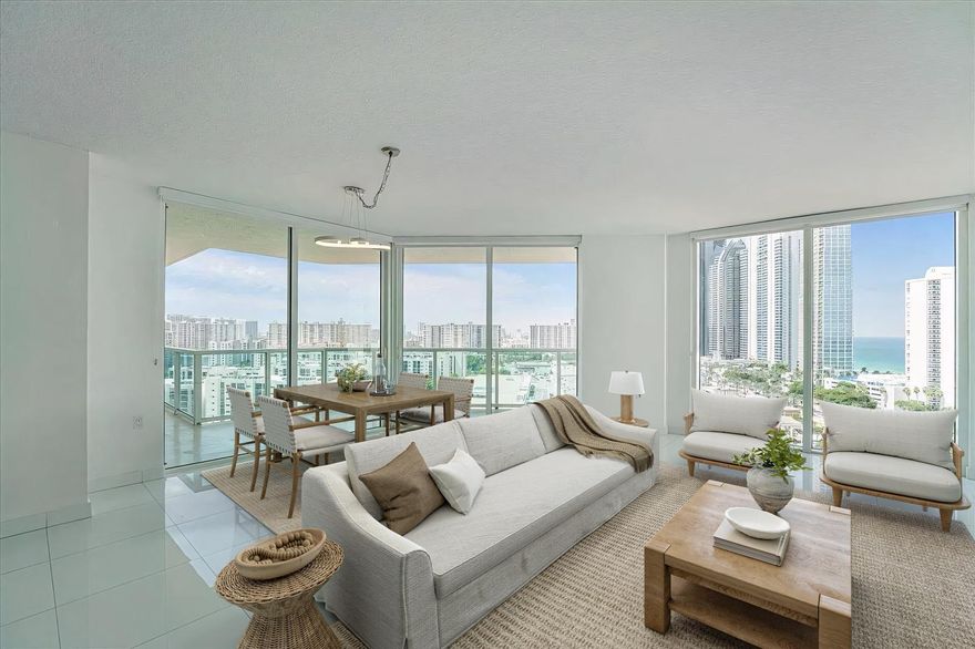 Spacious 3-bedroom, 2-bathroom corner unit with stunning city and ocean views. Featuring marble and tile floors, wood floors in bedrooms (no carpet), stainless steel appliances, walk-in closets, and an in-unit washer & dryer. Enjoy an expansive tiled balcony and abundant natural light. Resort-style amenities include a private beach club at Sole, fitness center, pool, clubhouse, concierge, and valet parking. Prime Sunny Isles Beach location, walking distance to the beach, shops, and dining. Close to top schools, Aventura Mall, Oleta Park, and both airports. Pet-friendly condominium.
