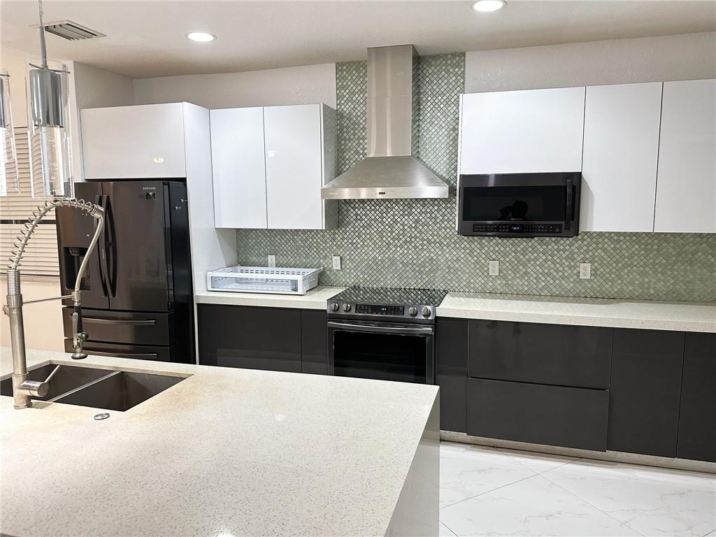 Welcome to this well-maintained home in the highly sought-after Savanna community in Weston. This bright and spacious 4-bedroom, 2.5-bathroom property offers a clean, modern feel with neutral porcelain tile downstairs and vinyl flooring upstairs. The open kitchen features quartz countertops, oak wood cabinets with MDF doors, and stainless steel appliances—perfect for both daily living and entertaining. The fourth bedroom offers flexibility and can serve as a home office. This home has been thoughtfully cared for and is in excellent condition. First and security deposits are required; last month’s rent depends on credit. Tenant occupied. Available July 15, 2025. Showings are Tuesdays from 9 AM–12 PM and Sundays from 5 PM–8 PM.