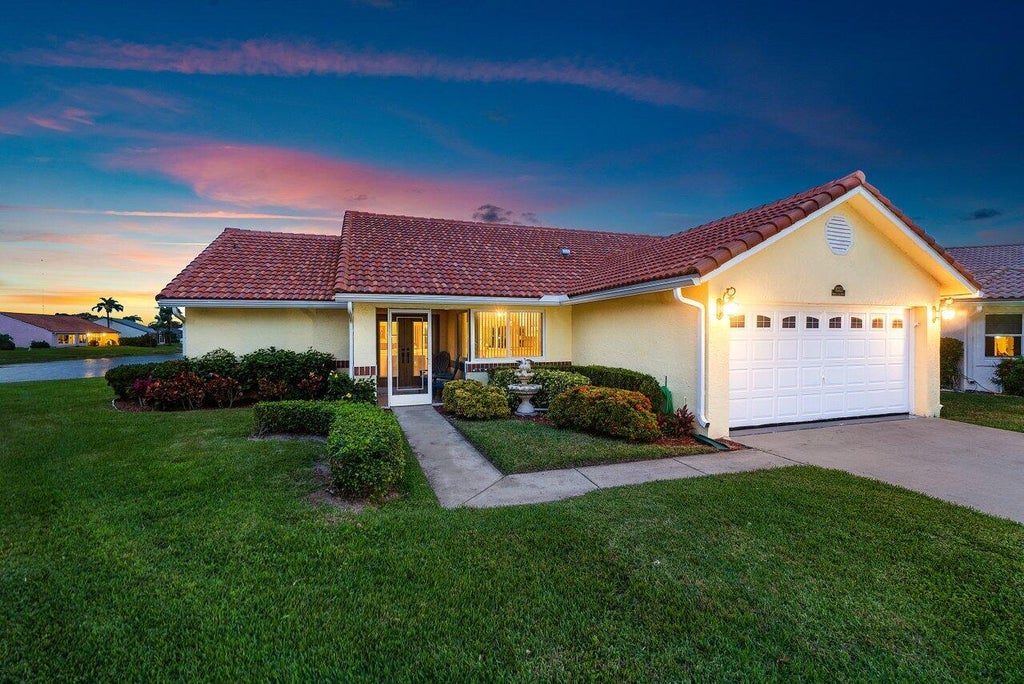 Photo of 8313 Bonita Isle Drive, Lake Worth, FL 33467 (MLS # R10953028)