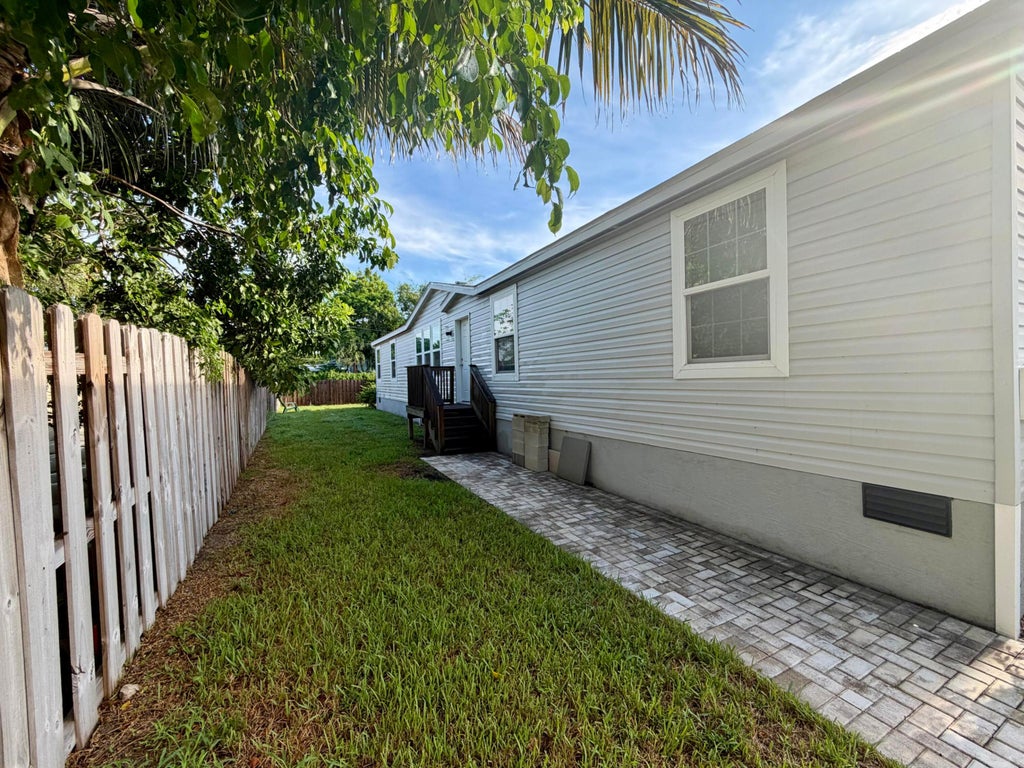 Photo of 755 RIDGEWOOD Drive, West Palm Beach, FL 33405 (MLS # B26074749)