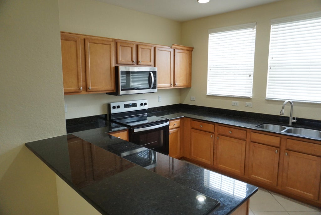 Photo of 810 Marina Del Ray Lane #2, West Palm Beach, FL 33401 (MLS # B26070105)