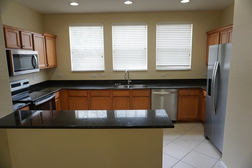 Photo of 810 Marina Del Ray Lane #2, West Palm Beach, FL 33401 (MLS # B26070105)