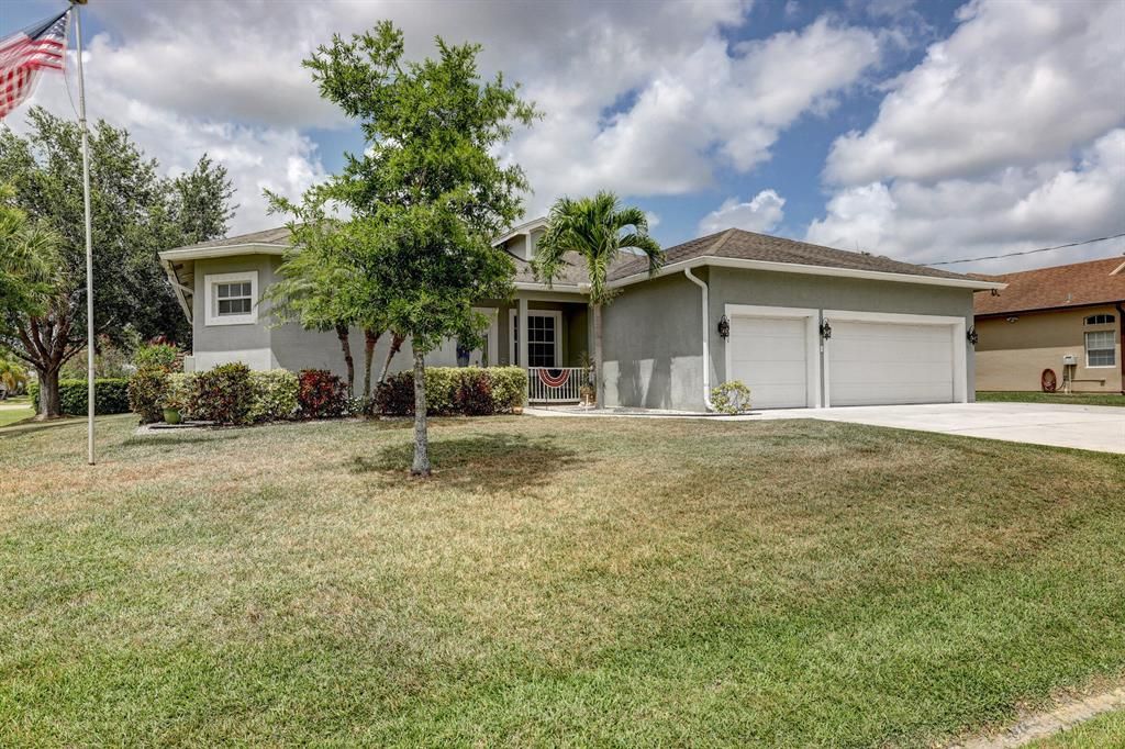 Photo of 2301 SW Lawford Street, Port Saint Lucie, FL 34953 (MLS # R10718228)
