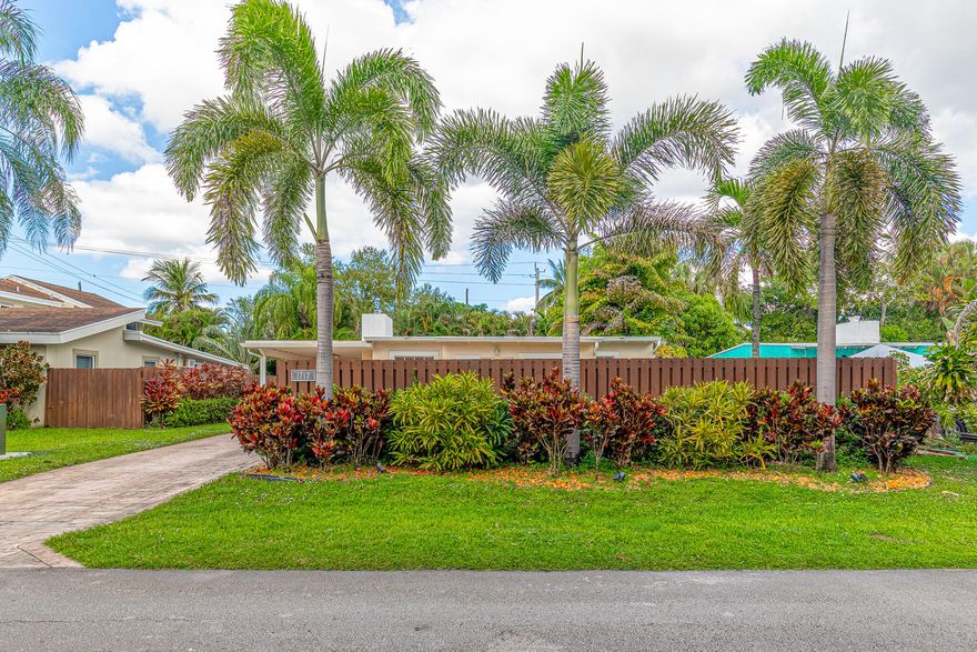 Great opportunity to live Minutes to Downtown, Airport, Port Everglades, Marinas and the Beach. Hidden gem neighborhood with 2 parks (amenities listed), including tennis, volleyball, fitness stations. 2 bedroom 1 bath home, fully fenced front and back yard, mature, tropical landscaping, additional storage shed. Covered parking carport Tile floors throughout.  Offering Privacy and tranquility. Pet possible with owner's approval and pet deposit