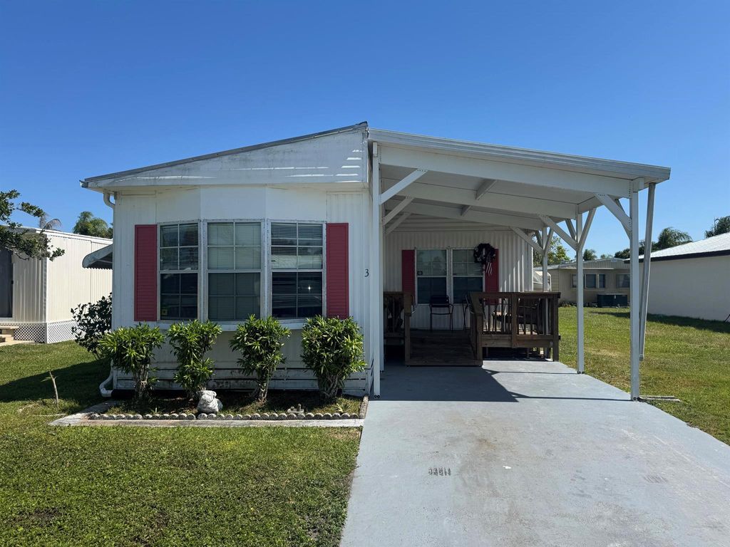 Photo of 3 Universidad Lane, Port Saint Lucie, FL 34952 (MLS # R11083391)