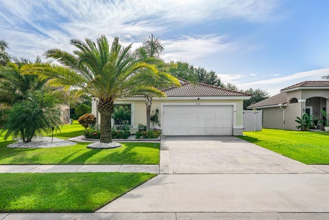 Photo of 6734 Lake Nona Place, Lake Worth, FL 33463 (MLS # B26083019)