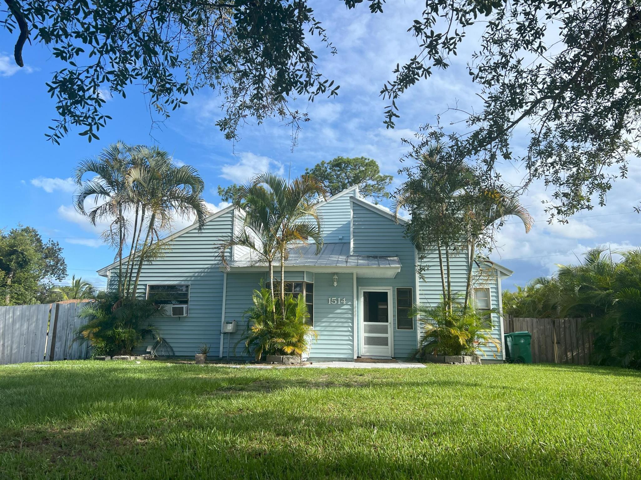 Discover the perfect blend of character and convenience with this Victorian-inspire 3-bedroom, 3-bath + bonus utility room. Home located in beautiful Port St. Lucie this home offers a rare opportunity to own a distinctive property in a neighborhood where most homes sell for much more. (SEE CMA)This home's inviting design features a spacious open layout, a bright kitchen, and plenty of natural light. The large backyard is ideal for outdoor gatherings or creating your own private retreat, space for a pool, while the 4-car driveway adds extra space and convenience.Situated in a prime location just minutes from I-95, Walmart, Tradition shopping center, and dining, daily errands and commuting are a breeze. Best deal in the area! Bring your ideas, priced to sell, great investment property!
