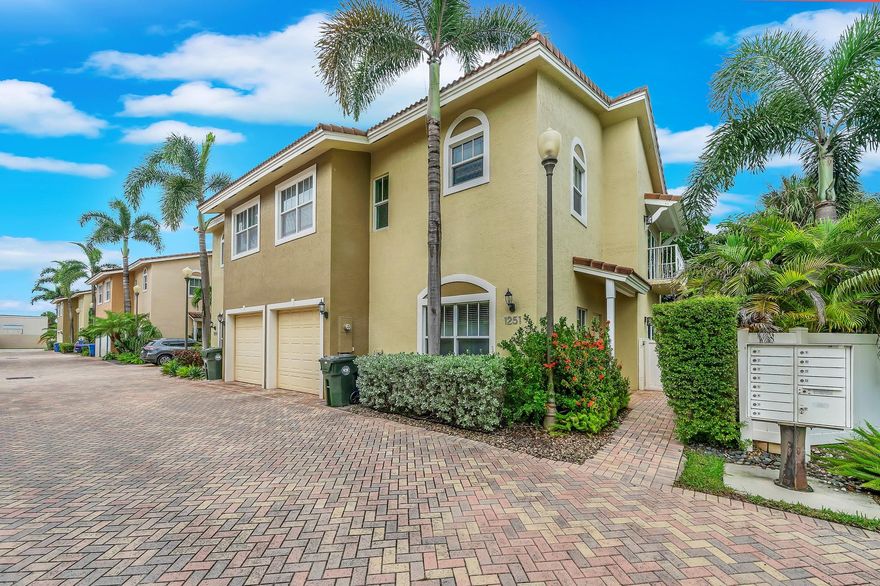 Live the ultimate South Florida lifestyle in this upgraded 3BR/2.5BA end-unit townhome in the heart of Oakland Park. Enjoy your private heated saltwater pool with sunny southern exposure, travertine deck, and tropical landscaping. Inside, a chef’s kitchen with quartz waterfall countertops, stainless appliances, wine chiller, and spa-inspired primary bath with oversized shower. Impact windows and doors, high ceilings, upgraded flooring, and 1-car garage with extra storage. Walk to cafes, breweries, and dining on Main Street.