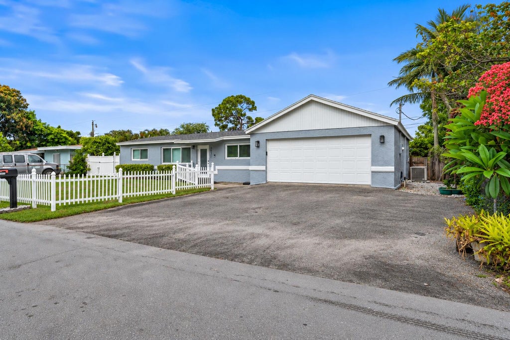 Photo of 2071 W Carol Circle, West Palm Beach, FL 33415 (MLS # B26074193)