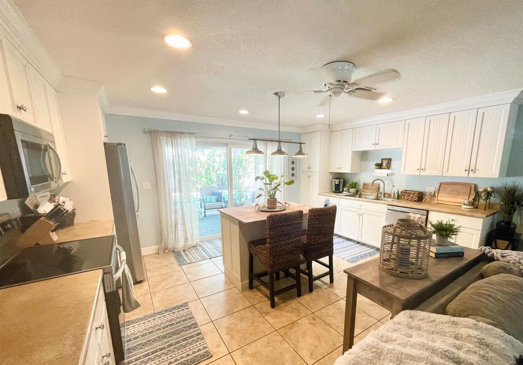 Photo of 403 Riverside Drive, Tequesta, FL 33469 (MLS # R11091785)