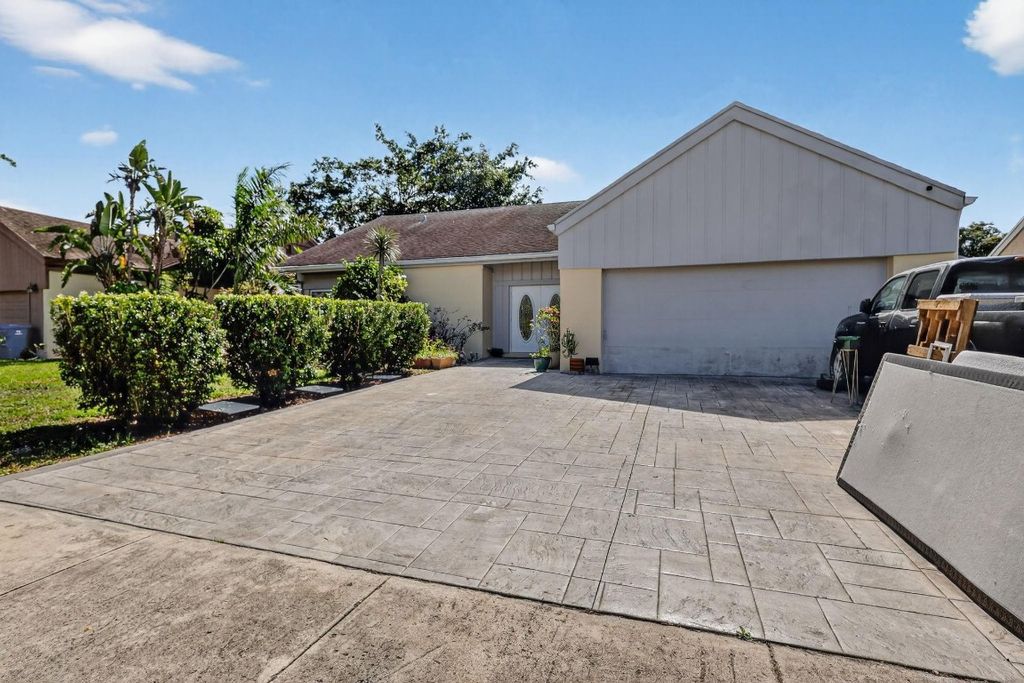 Photo of 9240 S Cypress Circle, Miramar, FL 33025 (MLS # F10545197)