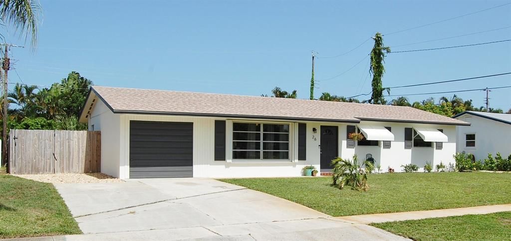 Photo of 26 Ridgewood Circle Cir, Tequesta, FL 33469 (MLS # R10821408)