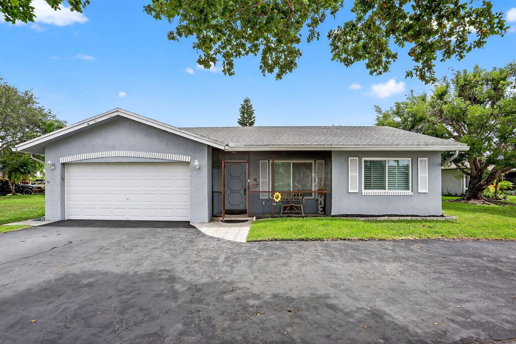 Photo of 9735 NW 82nd Street, Tamarac, FL 33321 (MLS # R11108278)