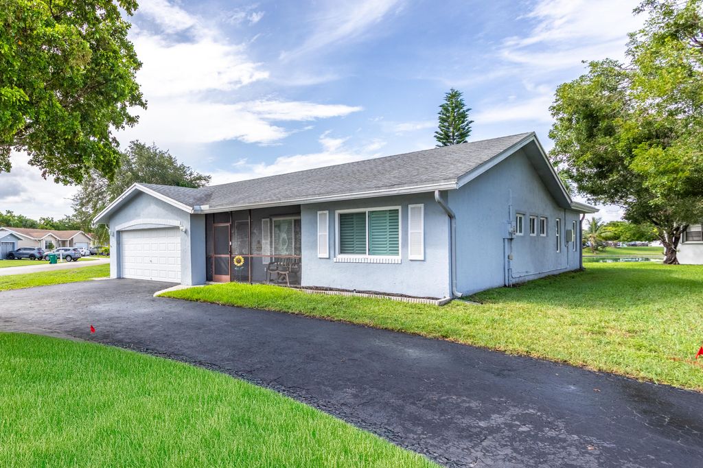 Photo of 9735 NW 82nd Street, Tamarac, FL 33321 (MLS # R11108278)