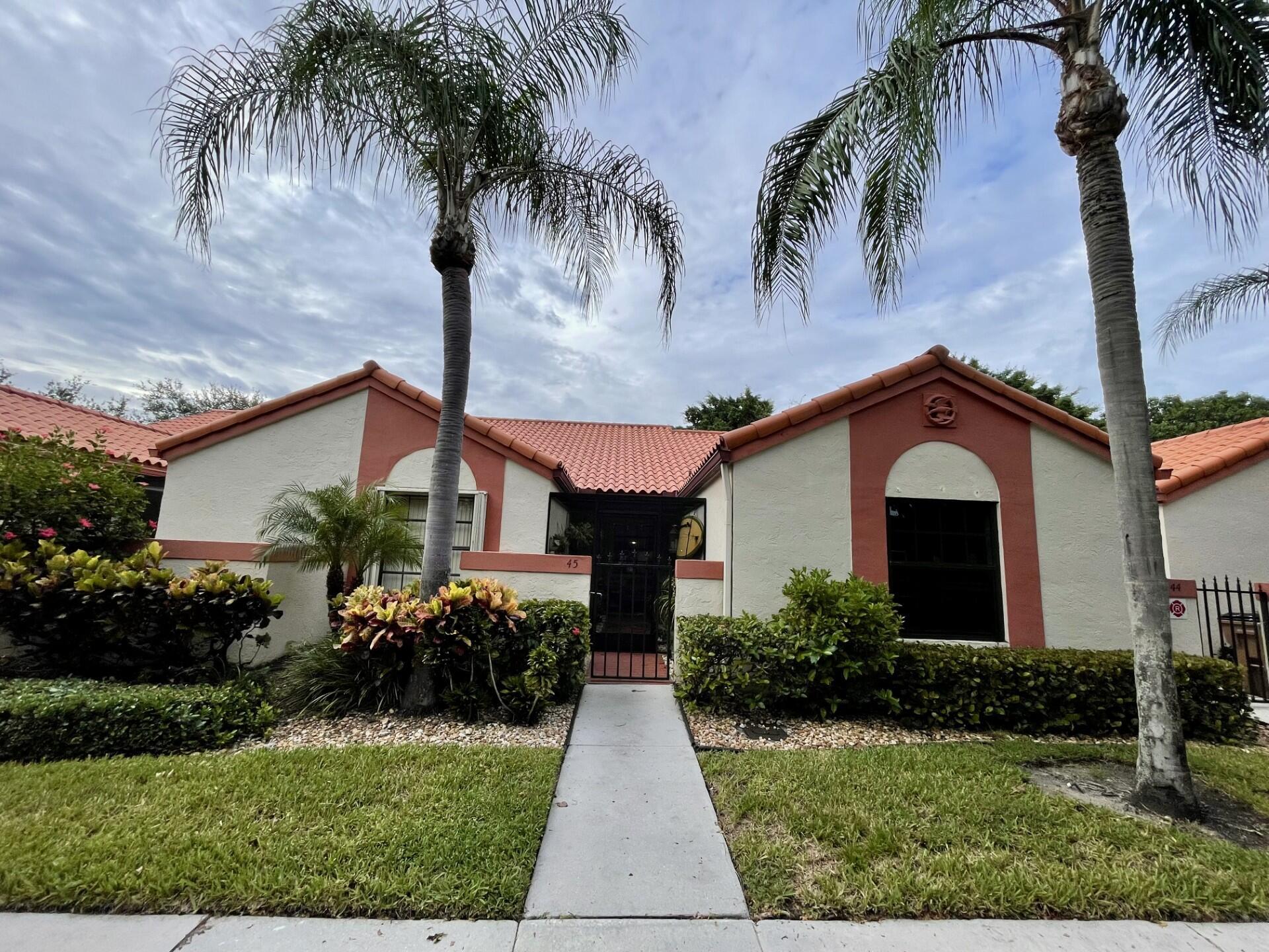 Impeccably Maintained & Move-In Ready! This beautifully updated 2-bed, 2-bath waterfront courtyard villa is located in the highly sought-after gated Independence Bay a vibrant, all-ages community with endless amenities.Step inside to find an inviting screened-in front porch, an eat-in kitchen, and a spacious living/dining area with volume ceilings that create an open, airy feel. Two generous master bedrooms feature walk-in closets, while a charming loft/play area offers the perfect spot for kids or a cozy reading nook. Enjoy renovated bathrooms and a brand-new AC unit installed just last month. A separate laundry room adds convenience, and a covered terrace with a hurricane-rated sliding door lets you relax and take in serene waterfront views.