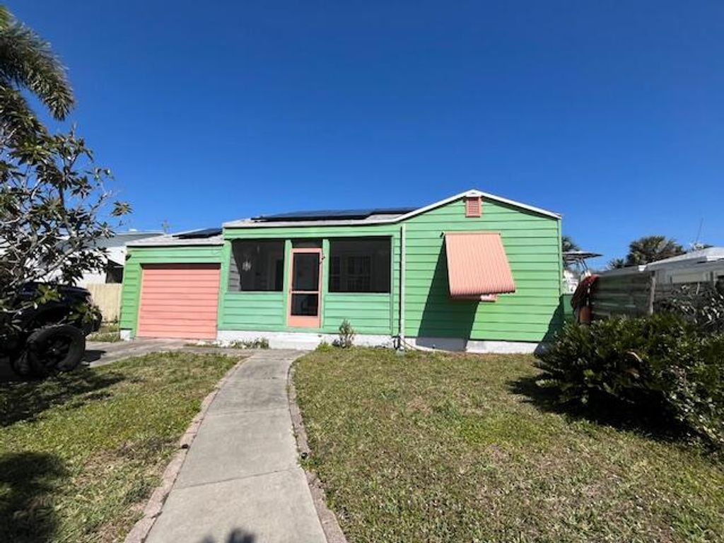 Photo of 1514 13th Avenue N, Lake Worth Beach, FL 33460 (MLS # R10963137)