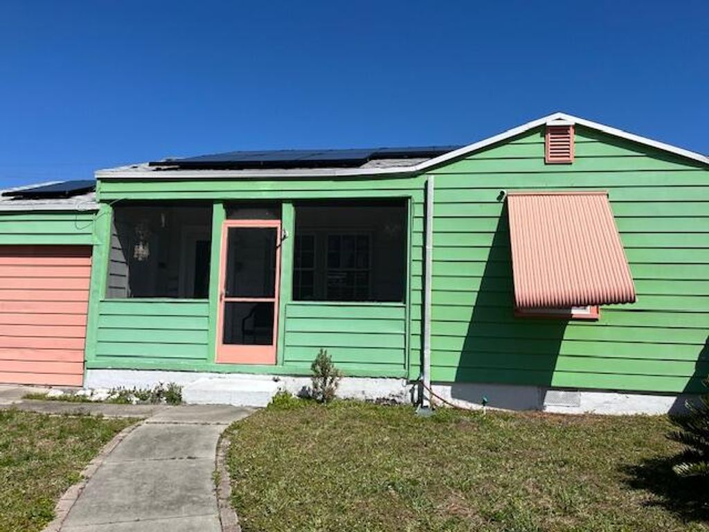 Photo of 1514 13th Avenue N, Lake Worth Beach, FL 33460 (MLS # R10963137)