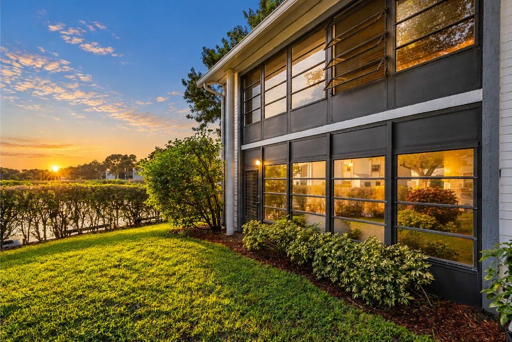 Photo of 15457 LAKES OF DELRAY Boulevard #101, Delray Beach, FL 33484 (MLS # B26092905)