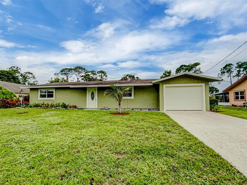Photo of 325 SE Calmoso Drive, Port St Lucie, FL 34983 (MLS # R10847839)