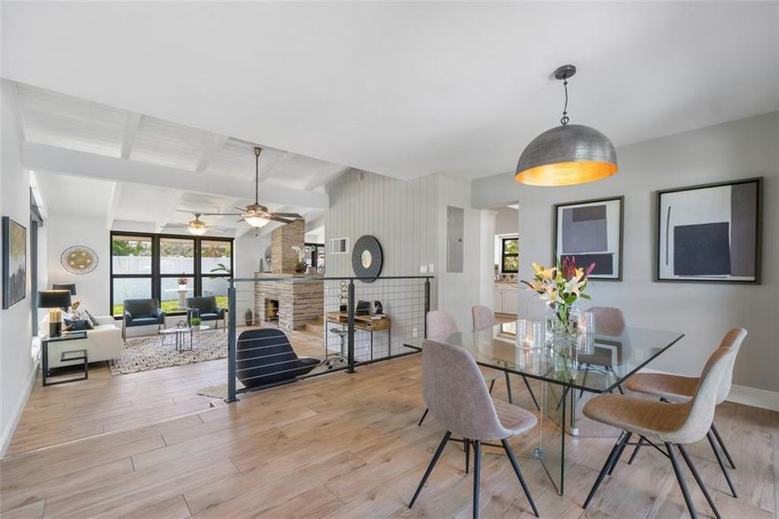 Fabulous mid-century modern design with soaring vaulted ceilings, stacked marble stone fireplace, and walls of glass with views of pool and spacious backyard. Open floor plan, 2 bay carport with ample storage, and dual driveways for extra parking for boat on an oversized 11,884 SF corner lot.  Italian porcelain flooring, plantation shutters, LG appliances, impact doors, custom closets, generator transfer switch all new in 2017. New AC & hot water system installed in 2019. Roof, exterior paint, and gutters new in 2020. Newly painted interior 2022.  Minutes to the beautiful Ft. Lauderdale Beach, Coral Ridge Country Club, Coral Ridge Yacht Club, George English Park (tennis), Hugh Taylor Birch State Park, and the Galleria Mall. A-rated School.