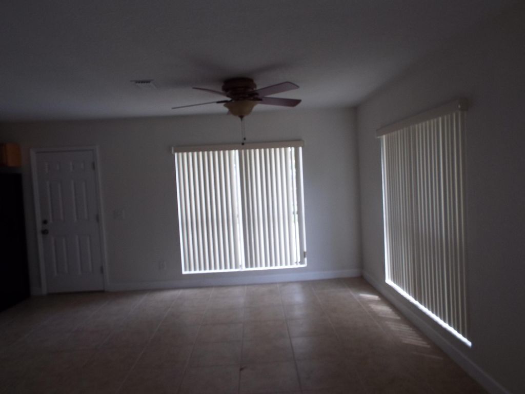 Photo of 1914 SW Libra Lane, Port Saint Lucie, FL 34984 (MLS # R11163235)