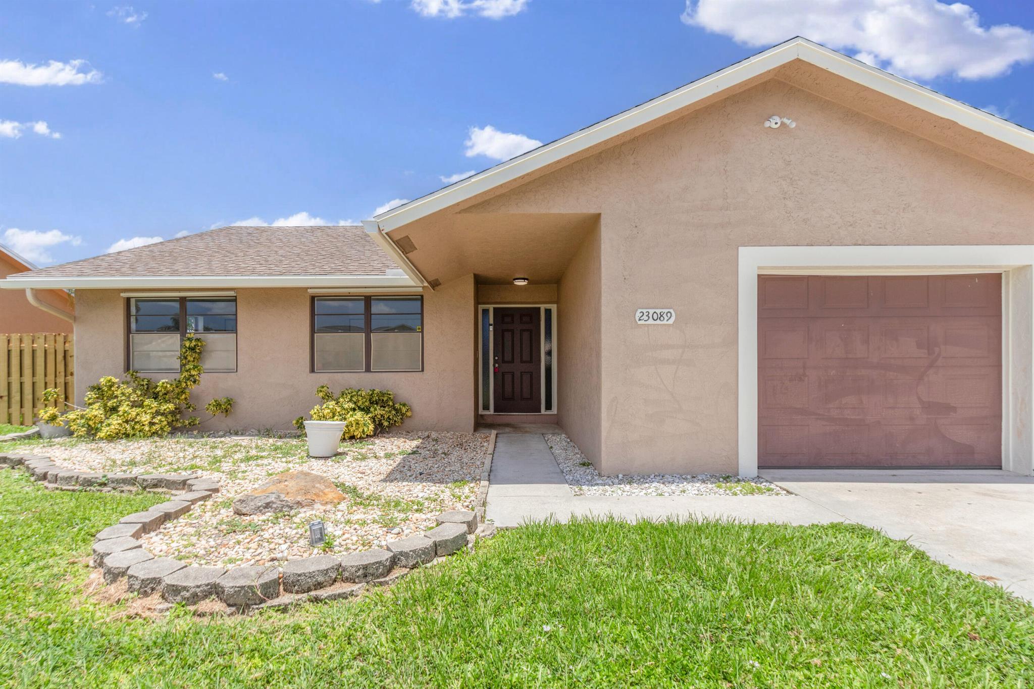Discover comfort & potential in this partially renovated 3BD/2BTH single-family home with an attached garage, located in sought-after West Boca Raton. Featuring updated flooring and refreshed bathrooms, this home offers spacious living, a functional layout and a private yard. Conveniently located near top-rated schools, shopping and parks. A great rental opportunity in a quiet friendly neighborhood! Schedule your Showing Today!!