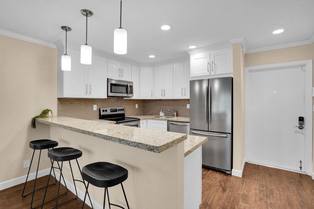 Photo of 600 Greensward Lane #203, Delray Beach, FL 33445 (MLS # F10509379)