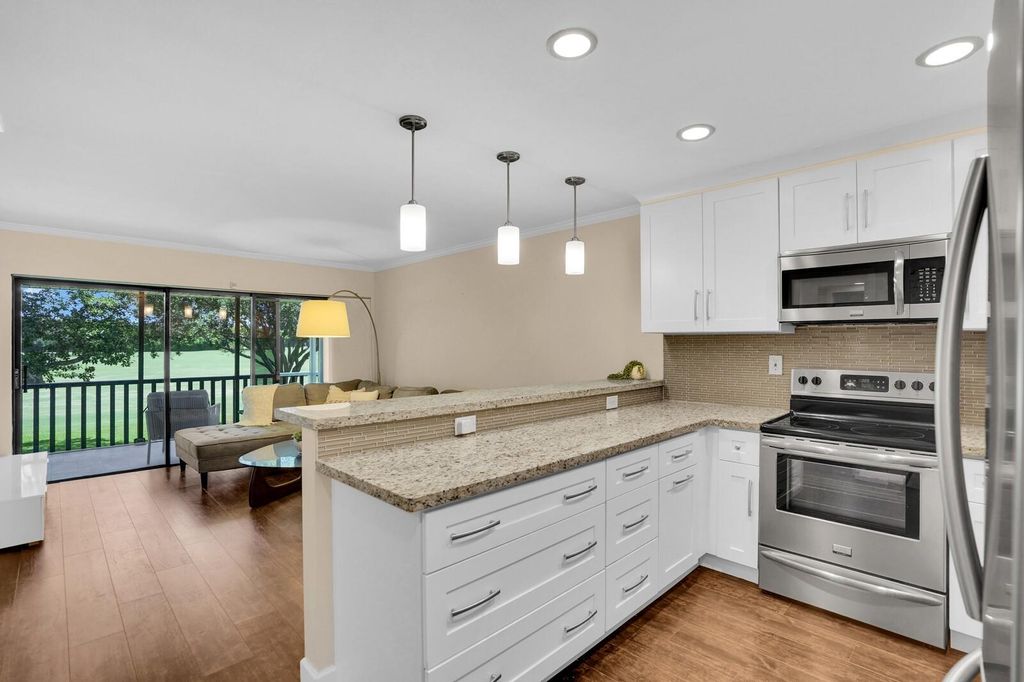 Photo of 600 Greensward Lane #203, Delray Beach, FL 33445 (MLS # F10509379)