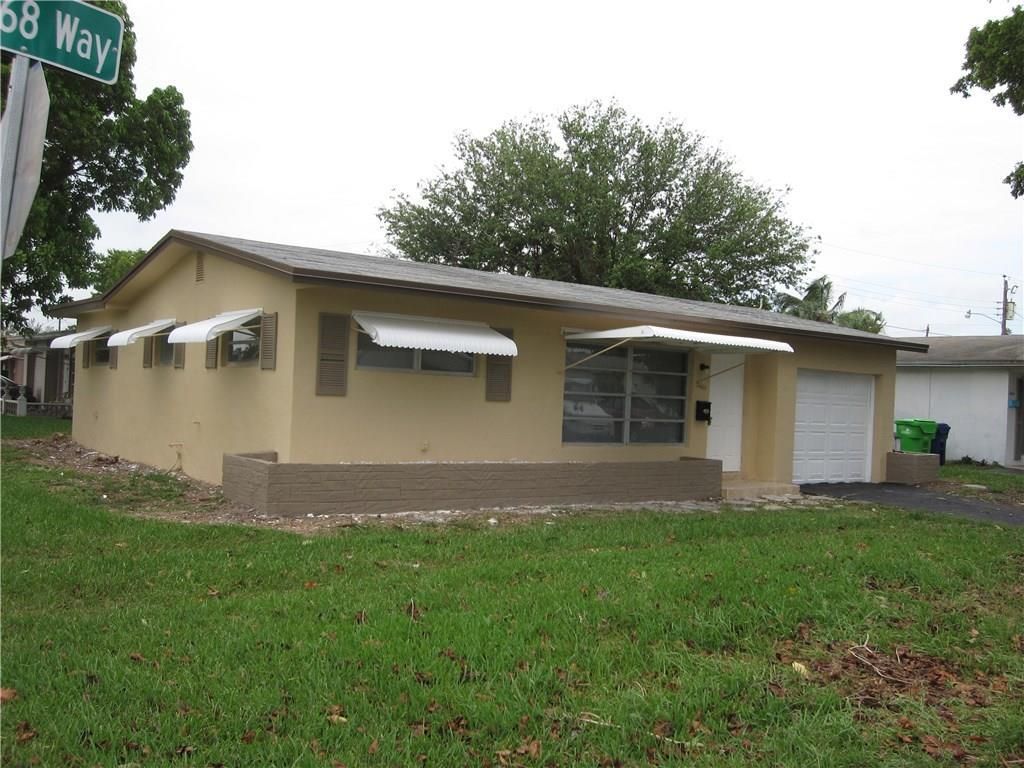 Photo of 2601 NW 68th Way NW, Sunrise, FL 33313 (MLS # B26000394)