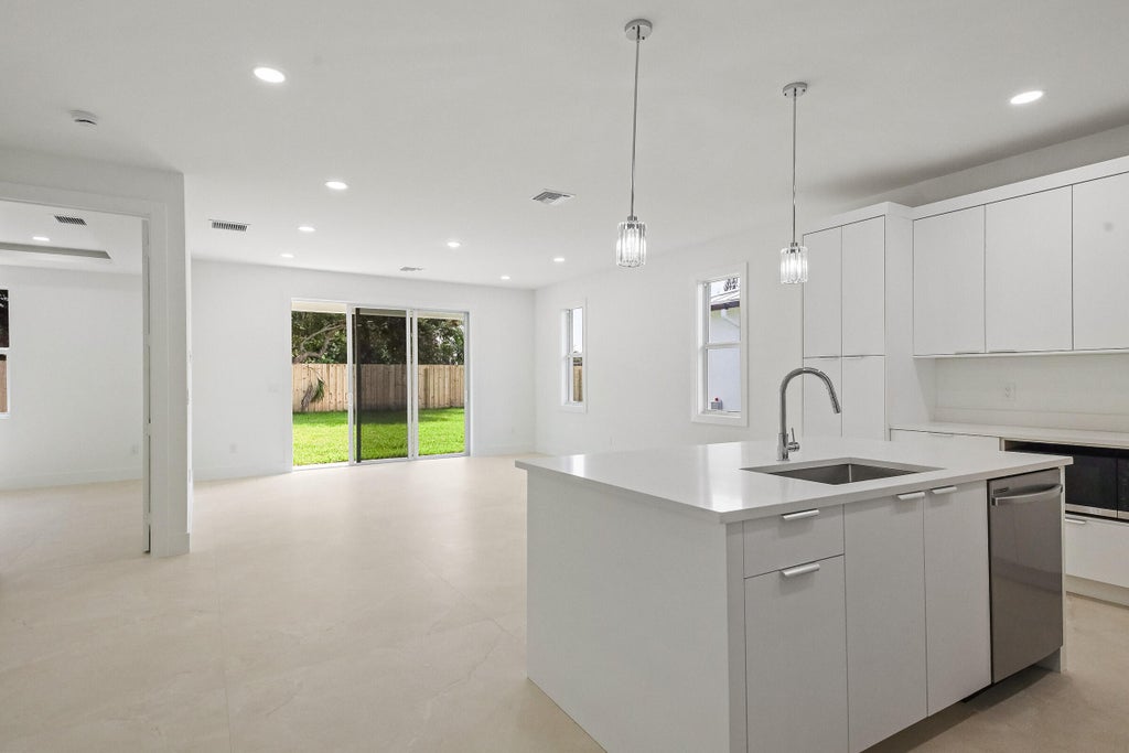 Photo of 4606 Hibiscus Avenue, West Palm Beach, FL 33417 (MLS # B26091716)
