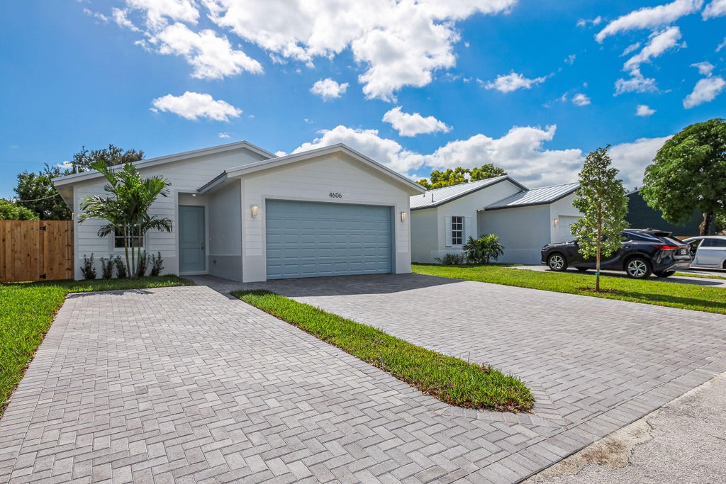 Photo of 4606 Hibiscus Avenue, West Palm Beach, FL 33417 (MLS # B26091716)