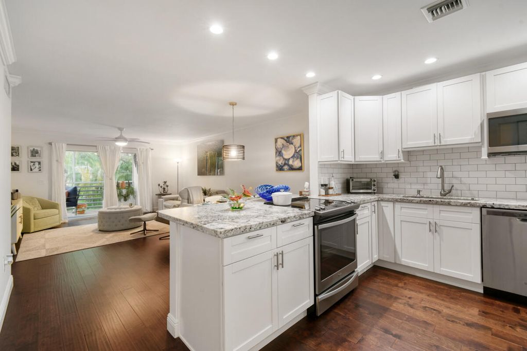 Photo of 717 S Us Highway 1 #113, Jupiter, FL 33477 (MLS # R10954302)