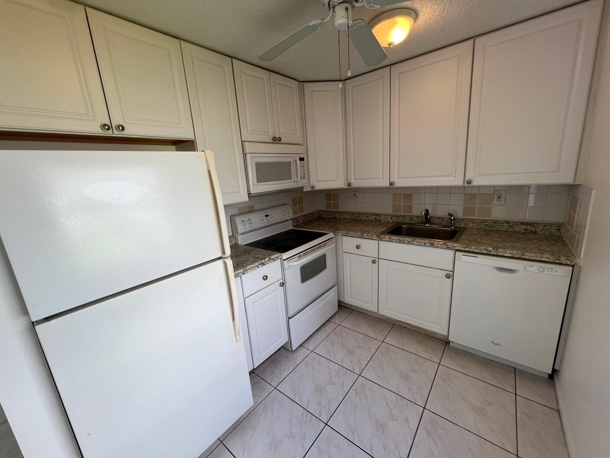 KINGS POINT BURGUNDY COND - Residential