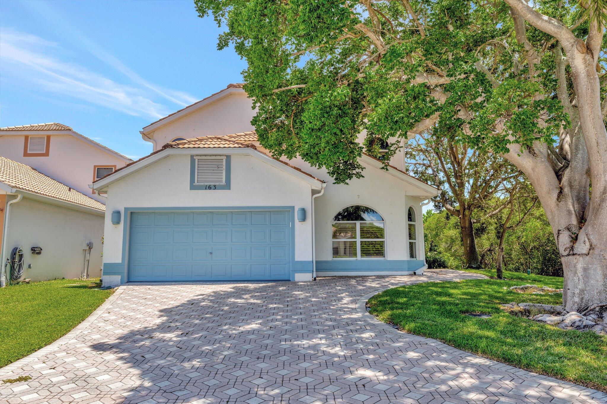 Watch the sunrise with a cup of coffee and the sunset with a glass of wine! This 3 bedroom 3 bath single family home is situated just steps away from both waveland beach and the intracoastal waterway the location cannot be beat. You can conveniently keep your boat in the marina directly behind the property. The gated community of Bay Tree has private access to a riverwalk, pool and clubhouse! The home itself features 20 foot ceilings, tile and wood floors and a large 2nd floor screened room plus a sun deck with hot tub. Come see this today!