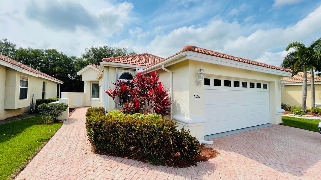 Photo of 626 SW Treasure Cove, Port Saint Lucie, FL 34986 (MLS # R10817799)